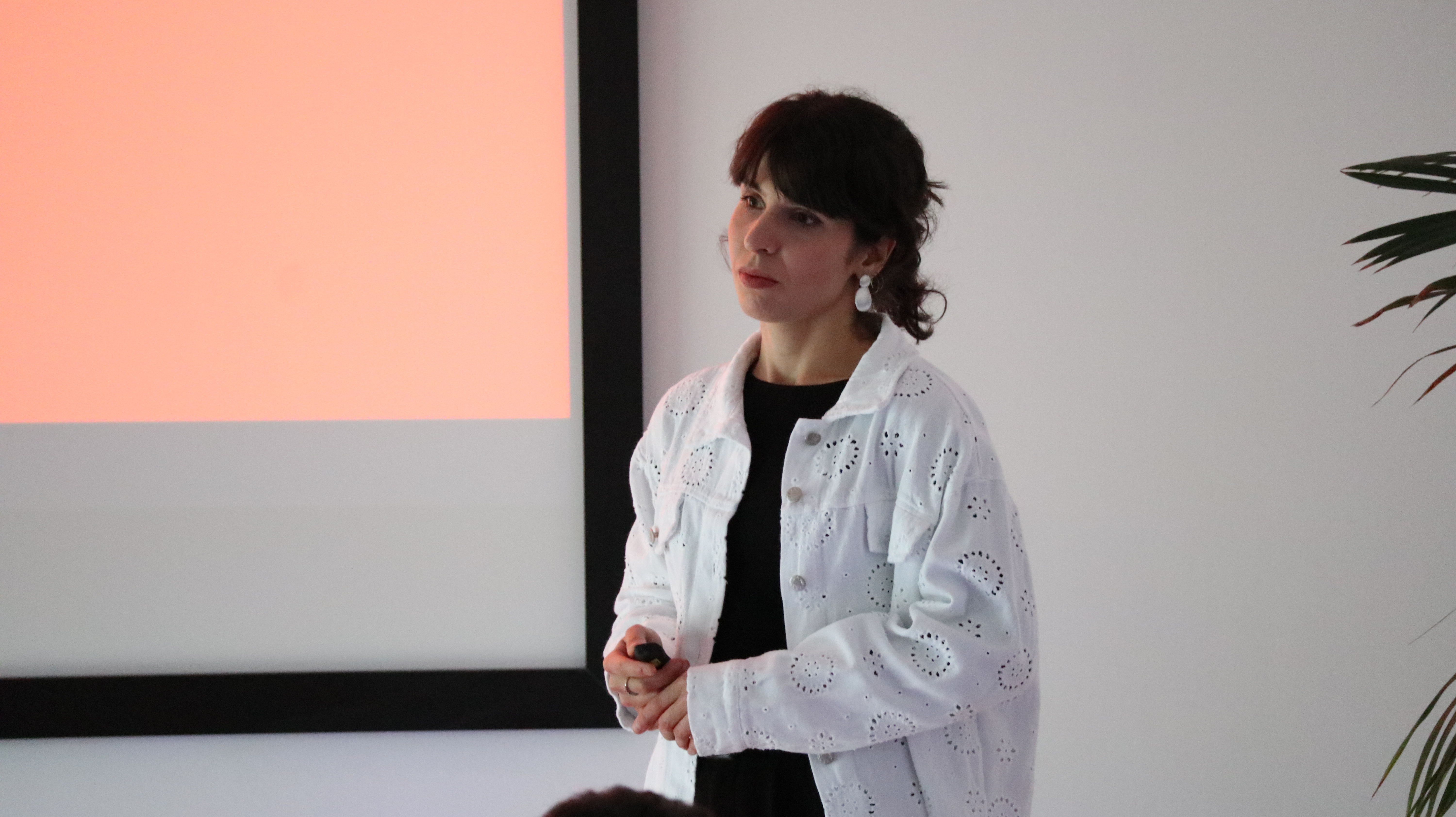 Isabella facilitating a community event